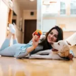 Why Does My Dog Go Crazy When I Lay On The Floor?